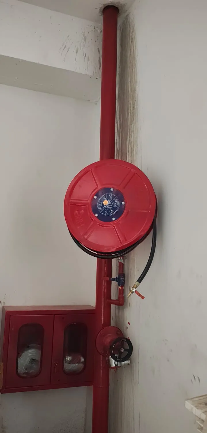 Close view of a fire hose reel drum and landing valve — Zed-King Institute of Fire And Safety gallery