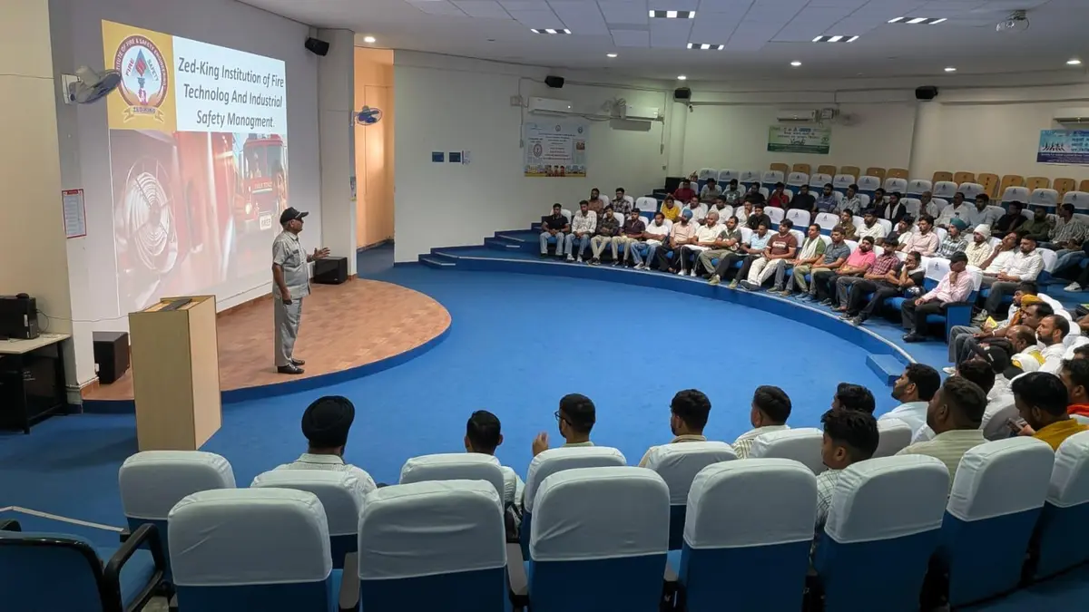 Fire safety awareness session led by a Zed-King trainer in a full auditorium — Zed-King Institute of Fire And Safety gallery