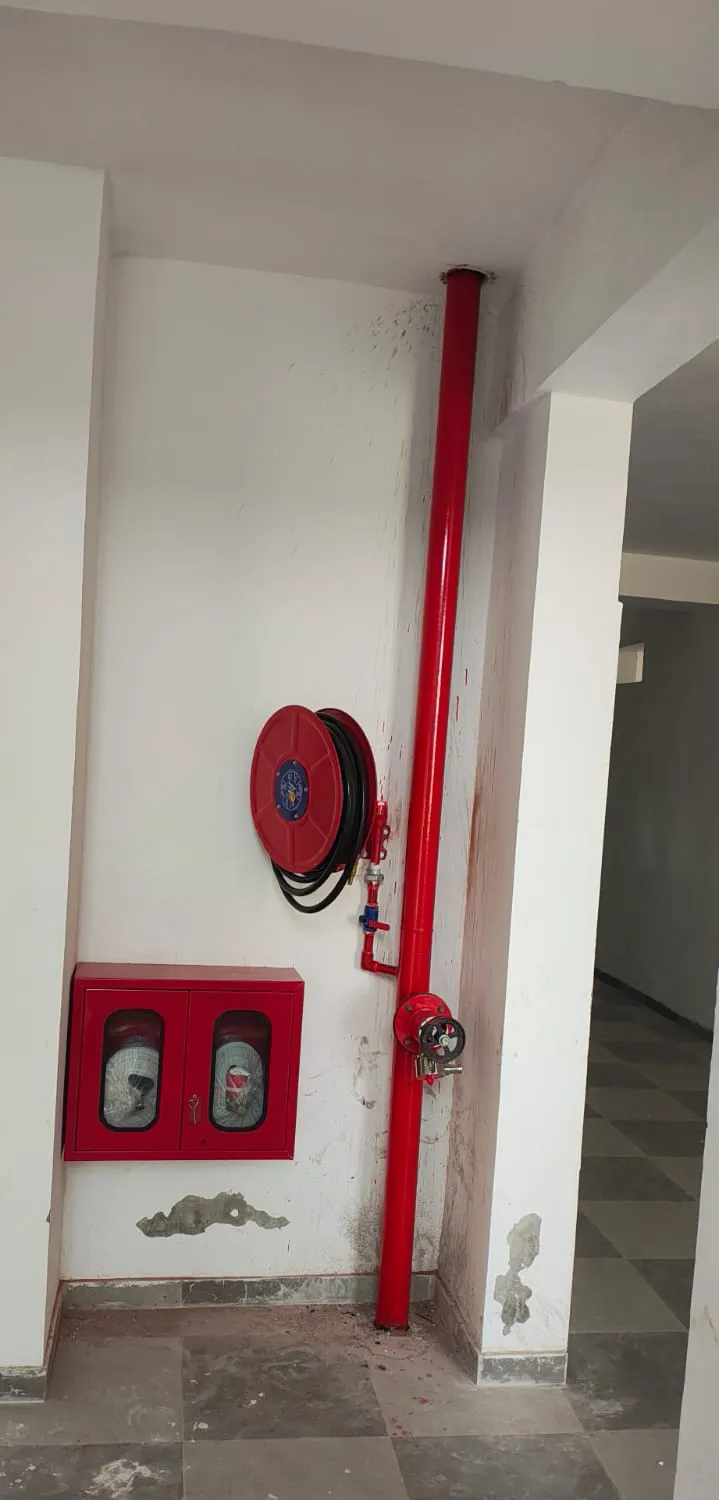 Wet riser with hose reel drum and double-door hose cabinet — Zed-King Institute of Fire And Safety gallery