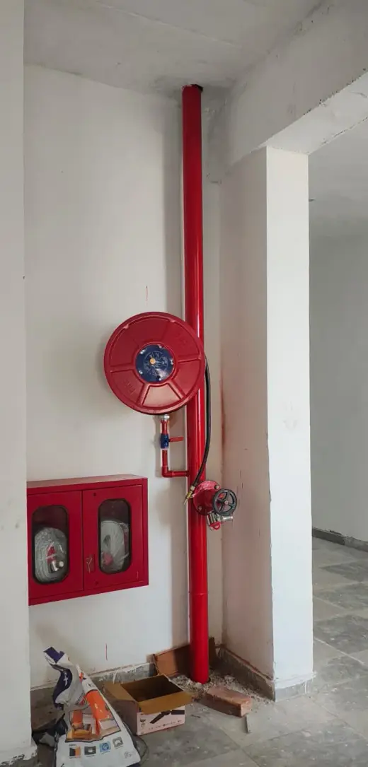 Fire hose reel, landing valve and hose box installed on a wet riser — Zed-King Institute of Fire And Safety gallery
