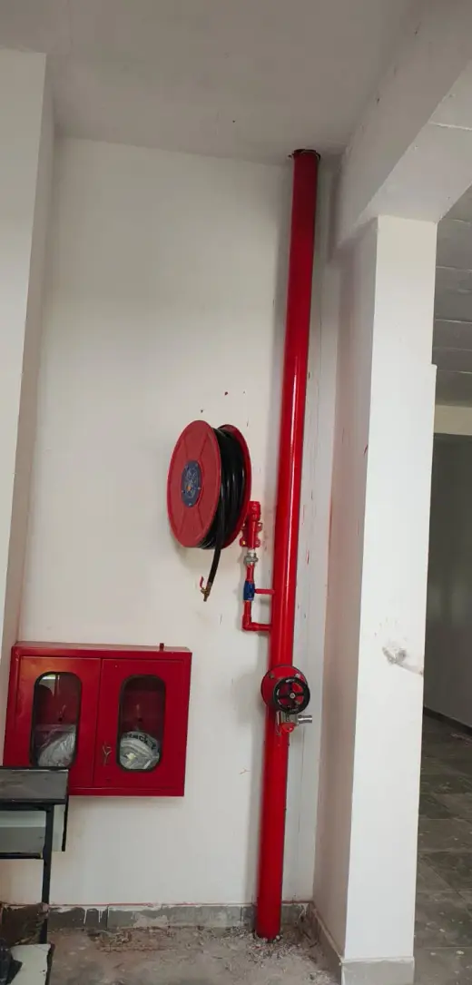 Wet riser, hose reel and hydrant landing valve fitted in a building corridor — Zed-King Institute of Fire And Safety gallery